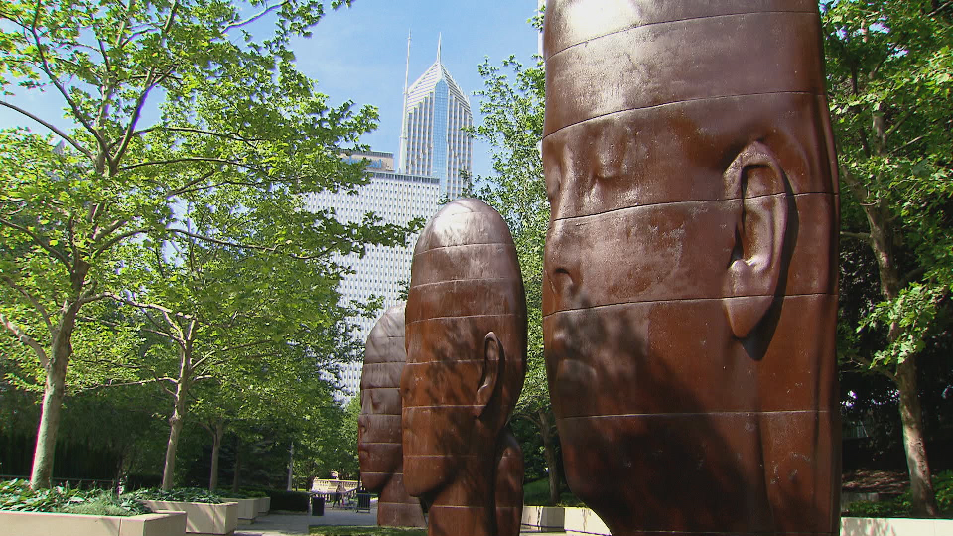 Giant Heads Turn Heads in Millennium Park Chicago News WTTW